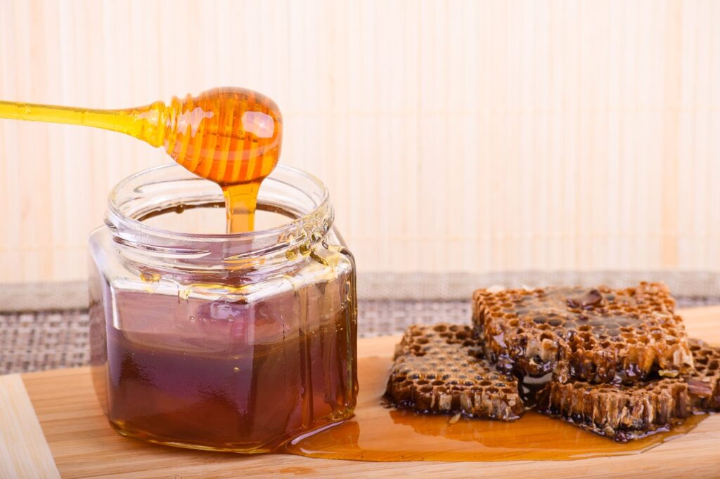 Close-up of a honeycomb, representing the natural, unprocessed source of Pure Desi honey.